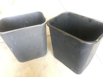 2 black office trash cans