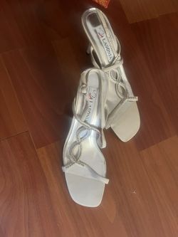 Beige and silver women’s kitten heels
