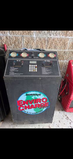 SELLING AS IS, NOT TESTED 
Robinair Enviro-Charge Dual R-12 & R-134a AC Recovery / Recharge Station