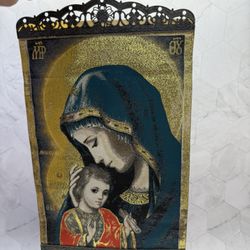 Beautiful woven religious tapestry banner featuring an icon of the Madonna and Child or The tapestry depicts a classic Christian icon of the Virgin Ma