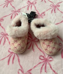 pink bow baby slippers