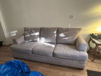 Bobs furniture grey sofa