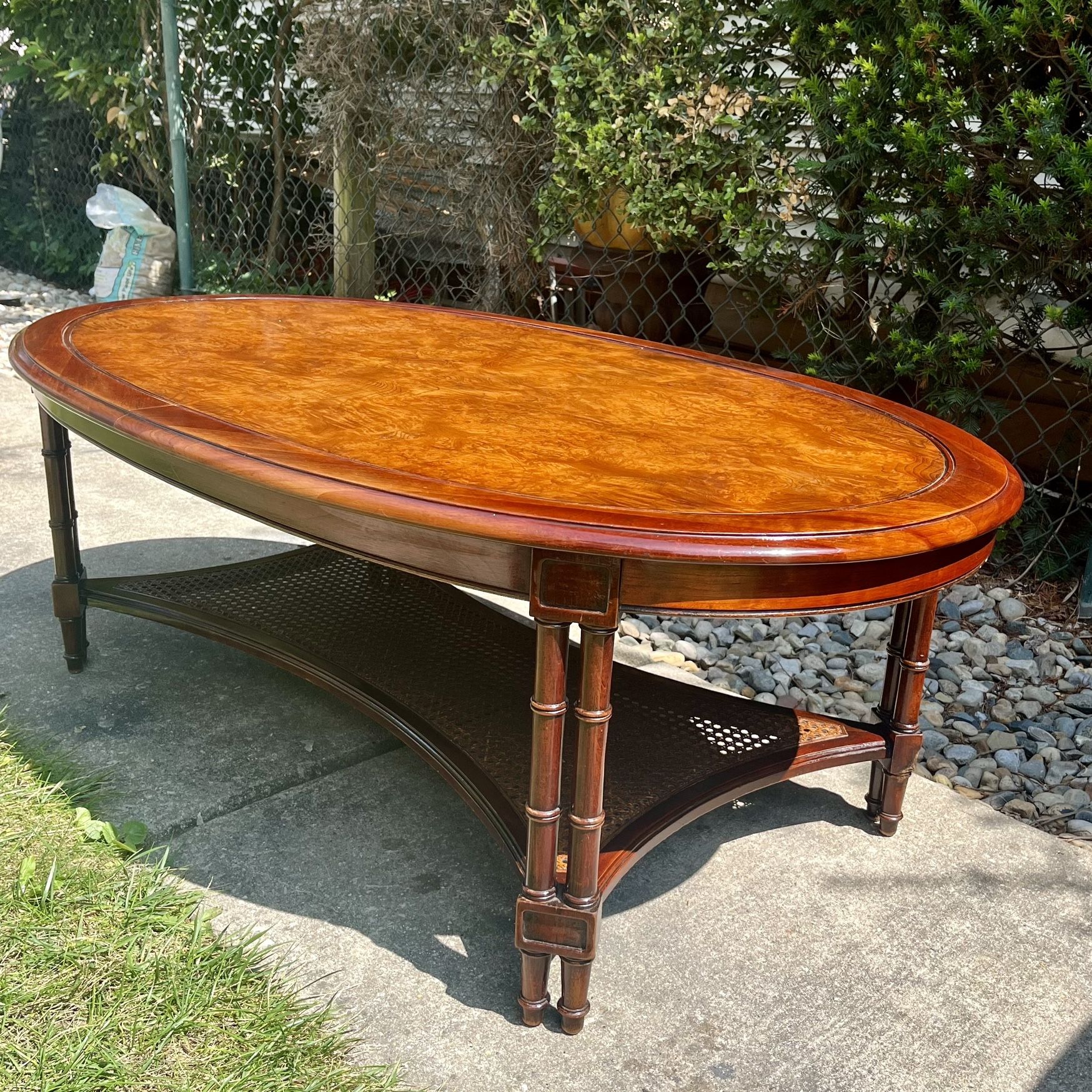 Hekman oval coffee table with cane shelf for Sale in Des Plaines