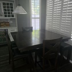 Dark Wood Dining Table And Seating