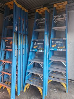 8ft fiberglass ladder in good conditions $140 each