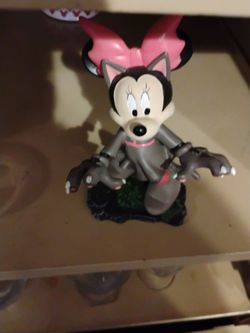 It's Minnie mouse and her Halloween costume