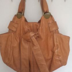 Authentic Kooba leather camel bow front shoulder handbag