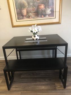 Like new black dining table set with 2 benches