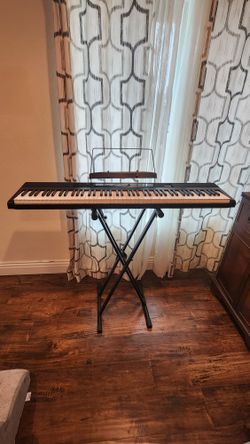Keyboard Piano & Stand - Perfect Condition!