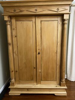 Genuine Light Wood Armoire with Shelves and Drawers