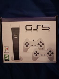 New gaming system with 2 controllers tons of games on it