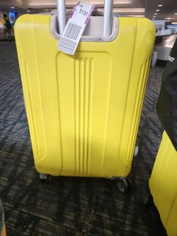 YELLOW SUITCASES $30.00