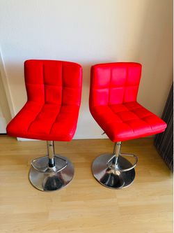 Set of 2 Red Bar Stools. Adjustable height with chrome base