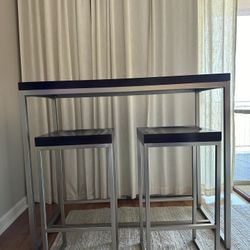 Bar table with 2 bar Stools  from  CB2 Store 