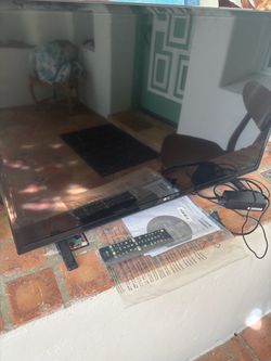 LG 32 inches Screen LED TV with remote control and paperwork