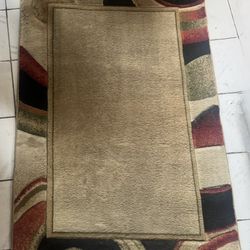 Abstract Swirl Accent Rug in Beige, Black, Red, Green