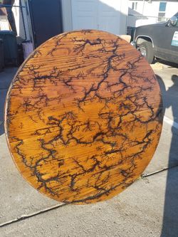 Custom made eagle claw foot round oak dining table w/ fractal burn design