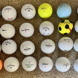31 Used Golf Balls