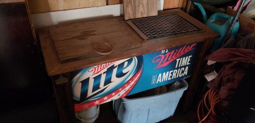 Miller Lite GRILL with small cooler built in.(never been use) Will also trade for good working construction tools.