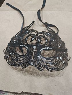 Metal mask with crystals