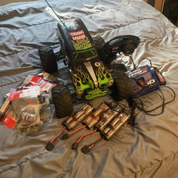 Discontinued Traxxas 1/10 Grave Digger RC Monster Truck Lot - Lots of Extras