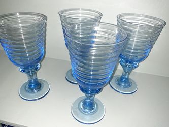 4 unique light blue glasses