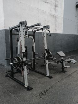 Gold's Gym Smith Machine Home Gym System with Bench and Weights. Zip33130. Delivery for extra