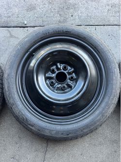 Spare tire and rim space Saver , 5 on 4.5 bolt pattern