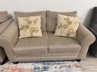 Beige loveseat