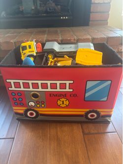 Toy trucks and other vehicles