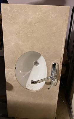 Sink And Faucet with Marble Surface 