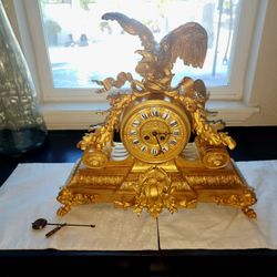 French Antique 19th Century Bronze Gold Plated Clock with Eagle Figure. Signed Horlocerie Paris