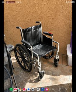 Wheel chair foldable with attachments