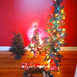 Three Little Christmas Trees With Ornaments