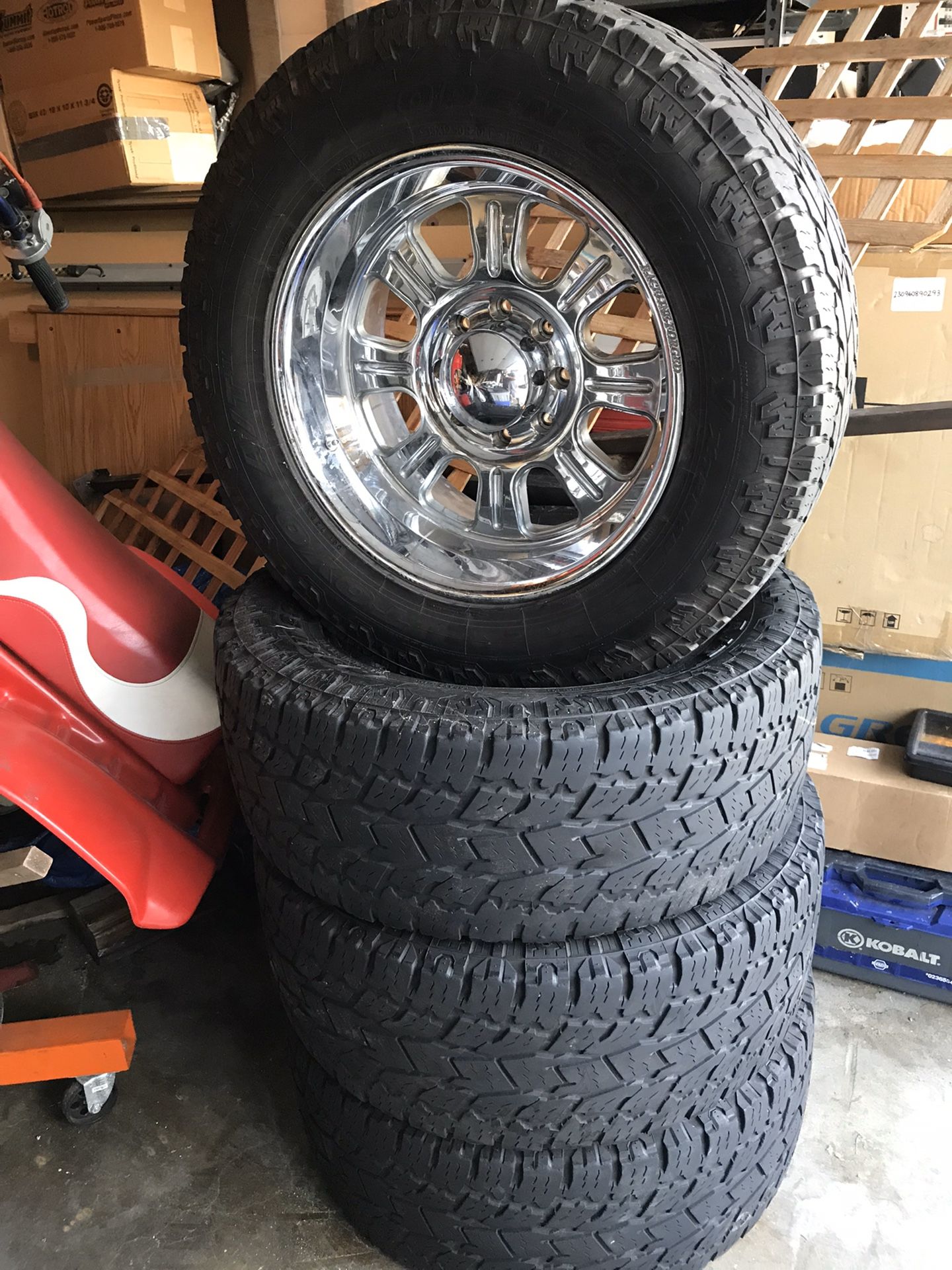 Set of Toyo AT Extreme 35X12.5X20 with Raceline Forged 20x10 8 lugs. $425.00 OBO. Possible trade for Golf Cart wheel and tires?