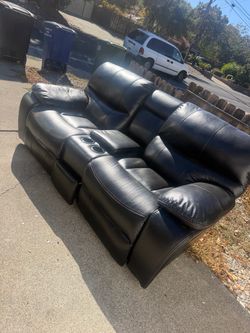 Black Leather Reclining Loveseat with Console