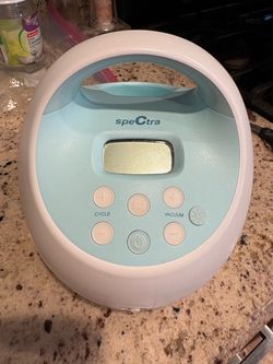 Spectra breast pump and charger