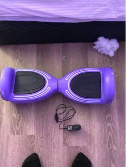 Purple hoverboard with charger and Bluetooth