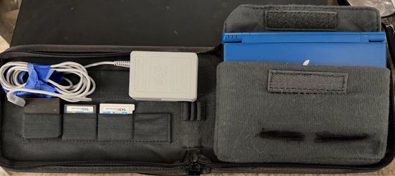 Nintendo DS XL with case and 5 games