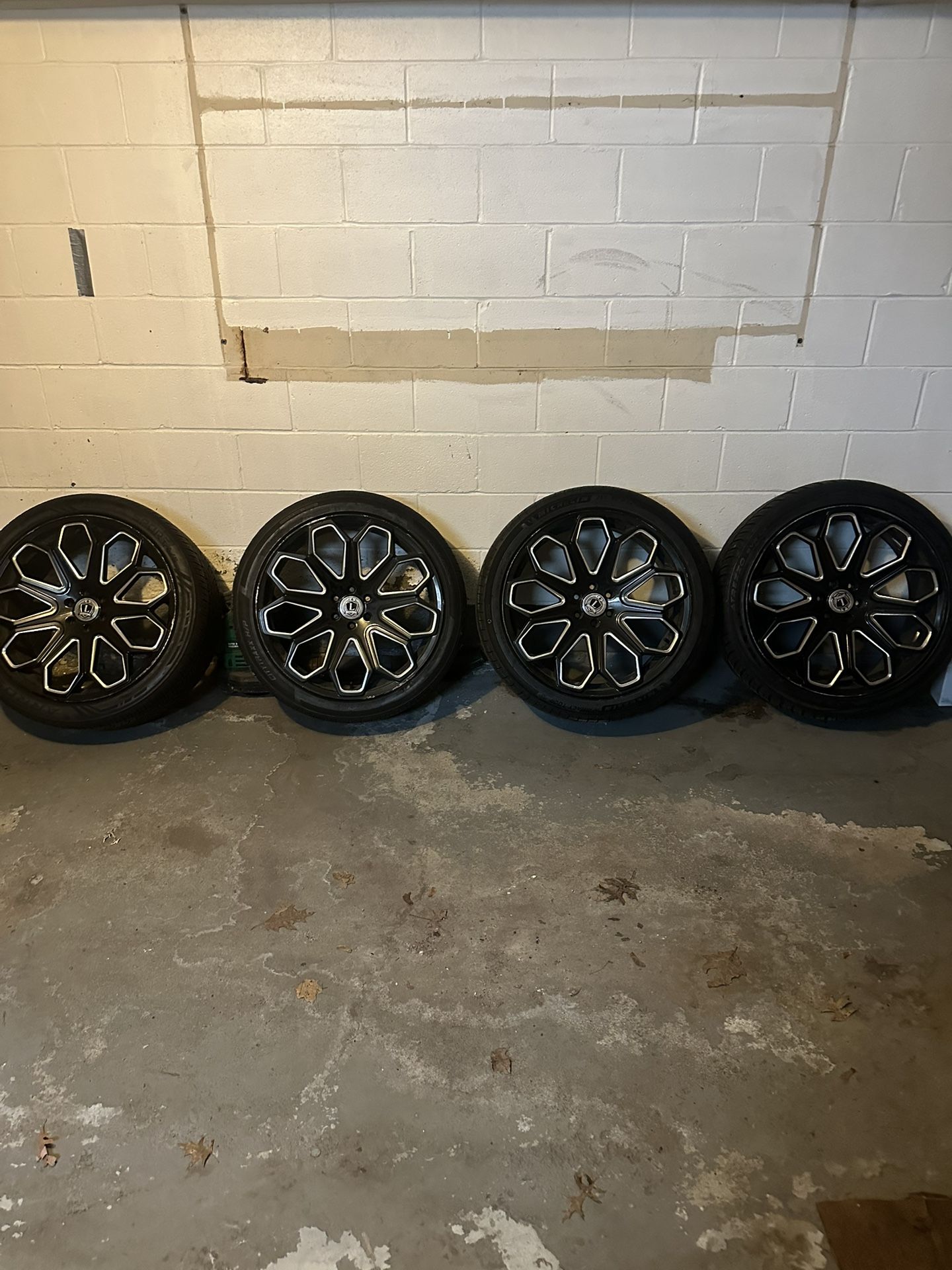 22 inch rims tires pay four grand for one 1500