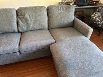 Living Spaces Stark Dark Grey Sectional Sofa with Reversible Chaise