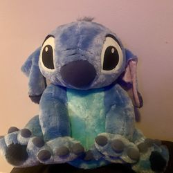 Giant Stitch plushie and medium plushies