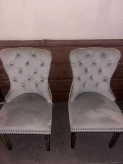 2 grey chairs