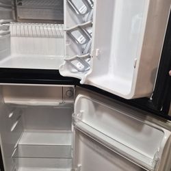 2 mini fridges, top one $30, bottom one $60