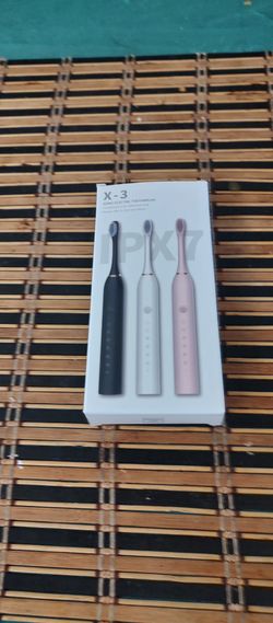 Electric Toothbrush    Brand New 