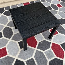 Black wooden end table