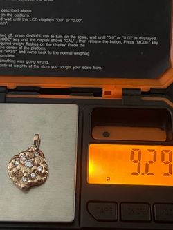 Beautiful 14 karat pending nugget with natural diamonds waste 9.2 g and 6-7 pt and 1-33 pt natural diamonds