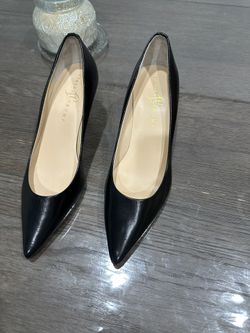 Ivanka Trump pointed toe pump in black leather. 2.5” heel. Great condition 10 Wide New No box.