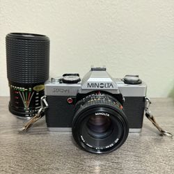 Minolta XG-A SLR 35mm Camera; 1.7/50mm lens & Tou Five star zoom Lens  