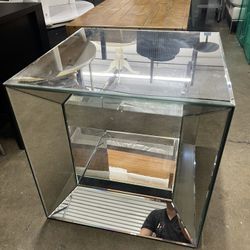 Mirrored End Table With Crack Inside That Can Be Covered By A Book Or Decor